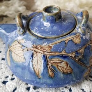 Blue and Brown Ceramic Art Teapot with Botanical Design